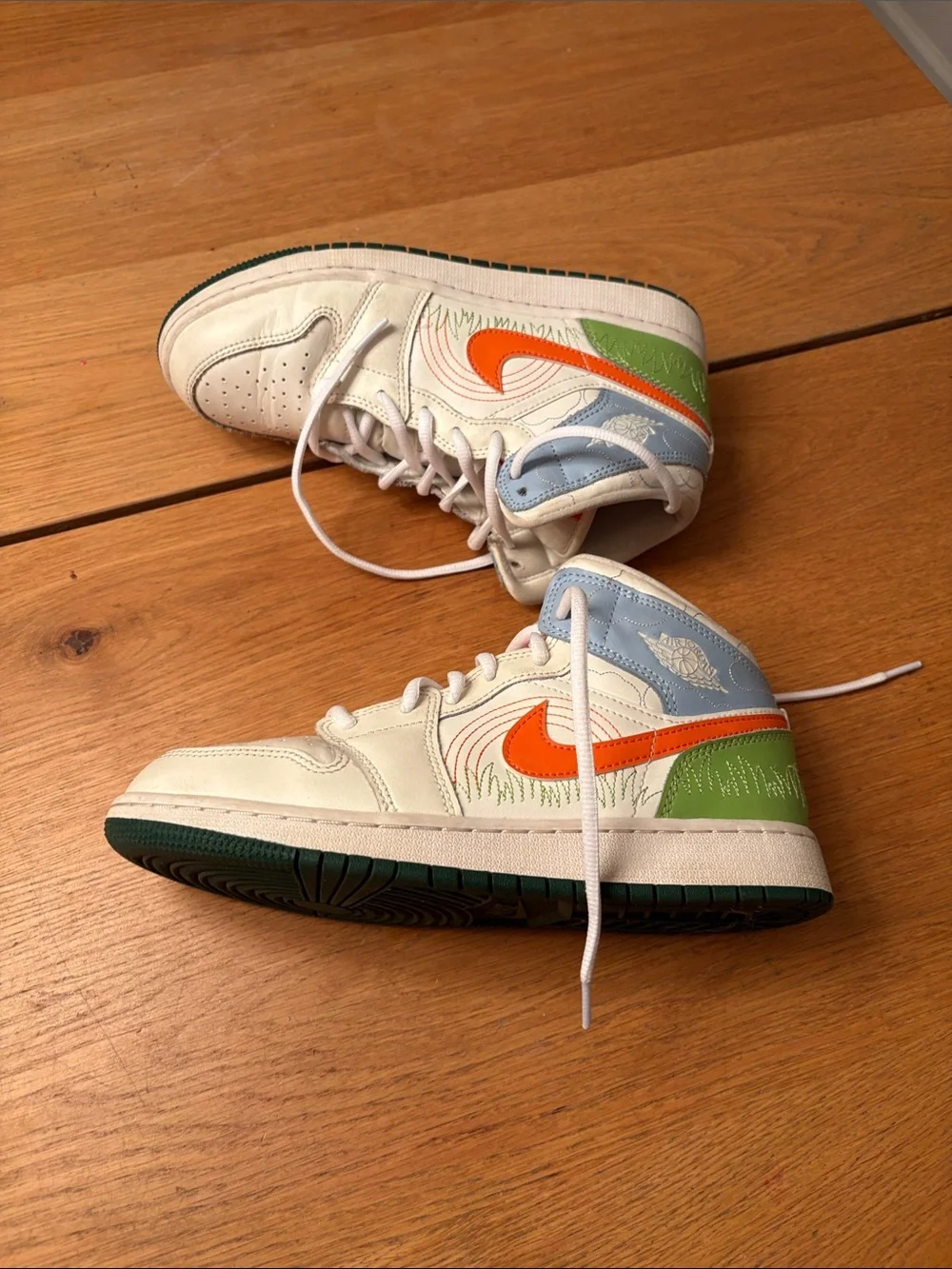 Kids White and Orange Basketball Shoes with Green Accent - Nike High Tops